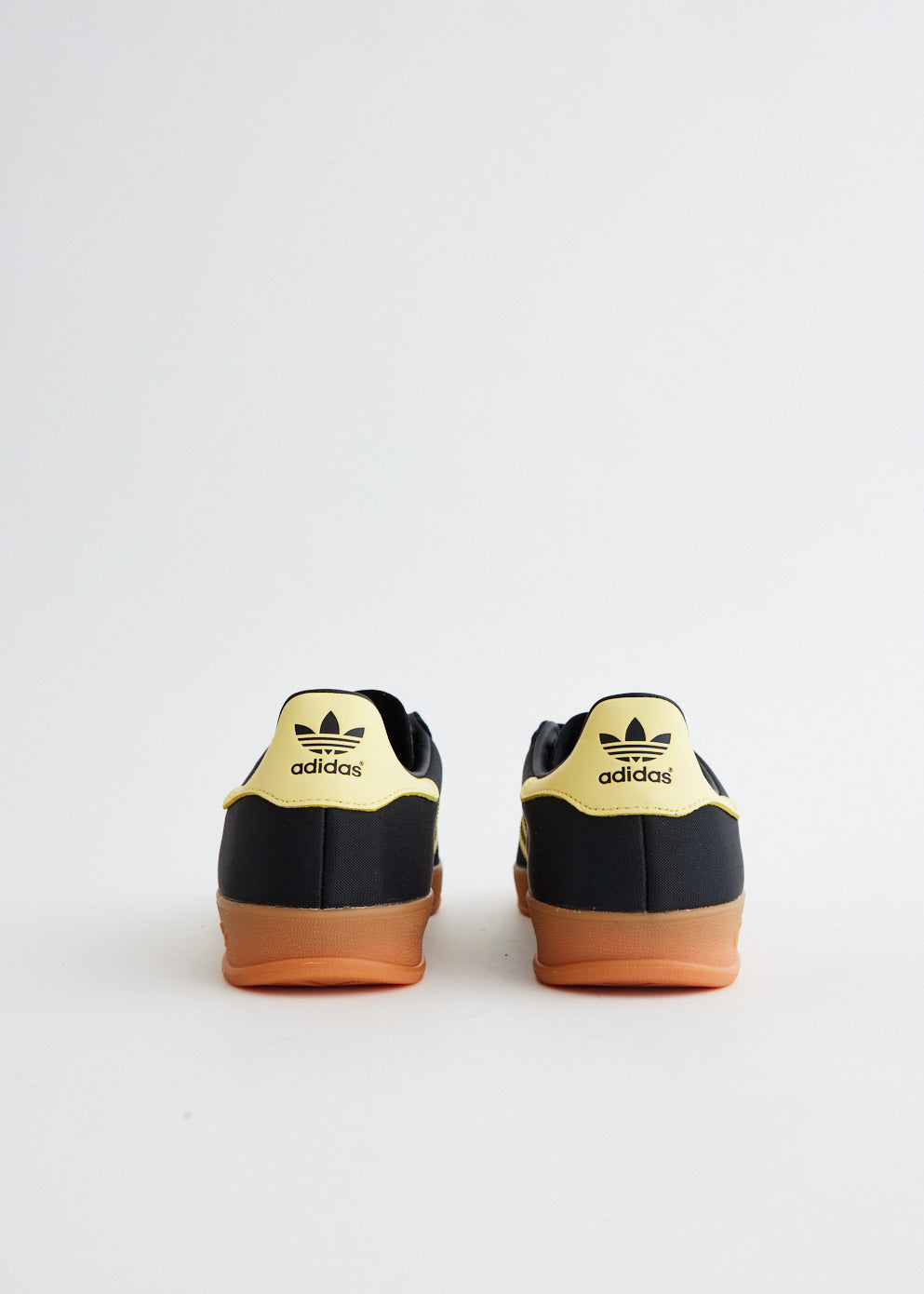 Adidas black shop yellow sneakers