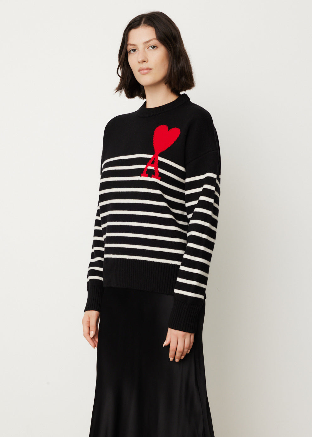 Black white outlet and red sweater